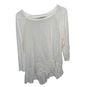 Cute white blouse with ruffle at bottom.also selling in a salmon/pink color